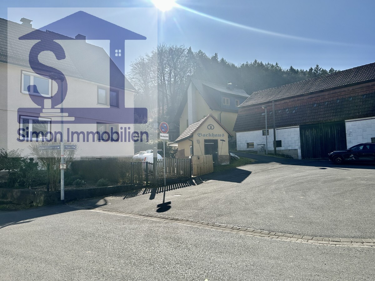 Immobilie in Grumbach - Ihr Traum vom Landleben – Charmante Doppelhaushälfte mit idyllischem Garten