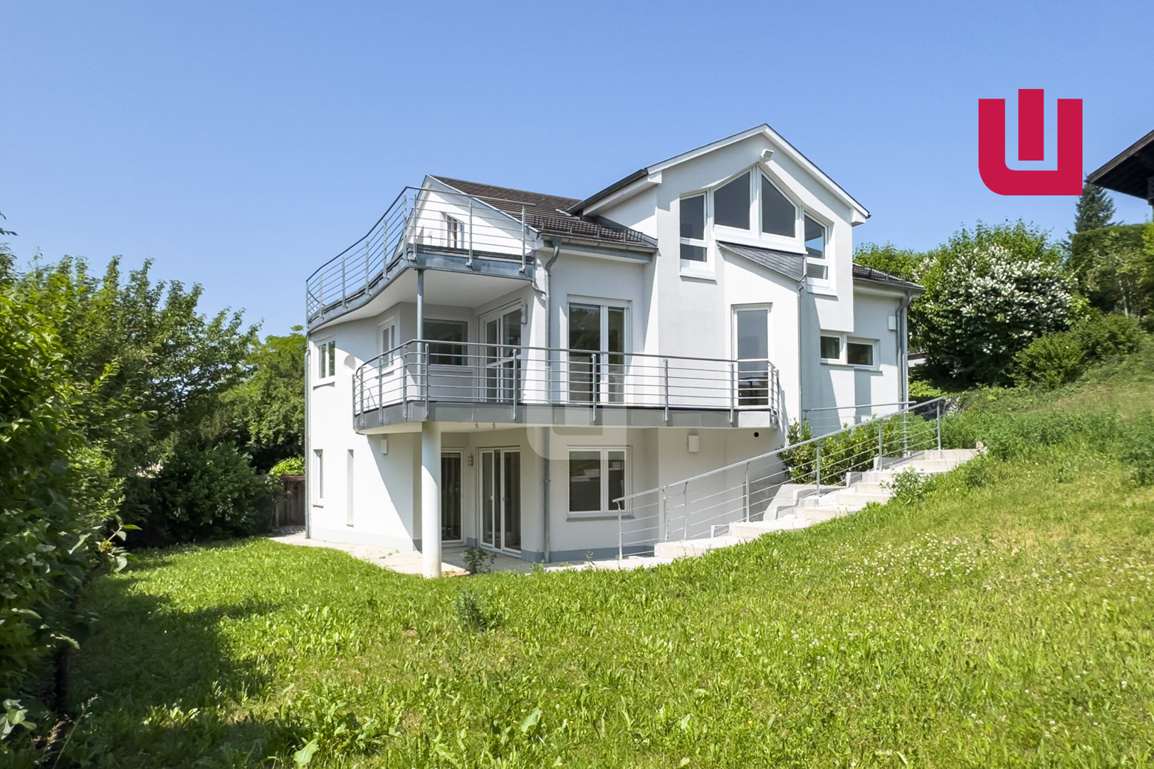 WINDISCH - Einzigartiges, modernes Architektenhaus auf großem Hanggrundstück mit Panoramaseeblick!