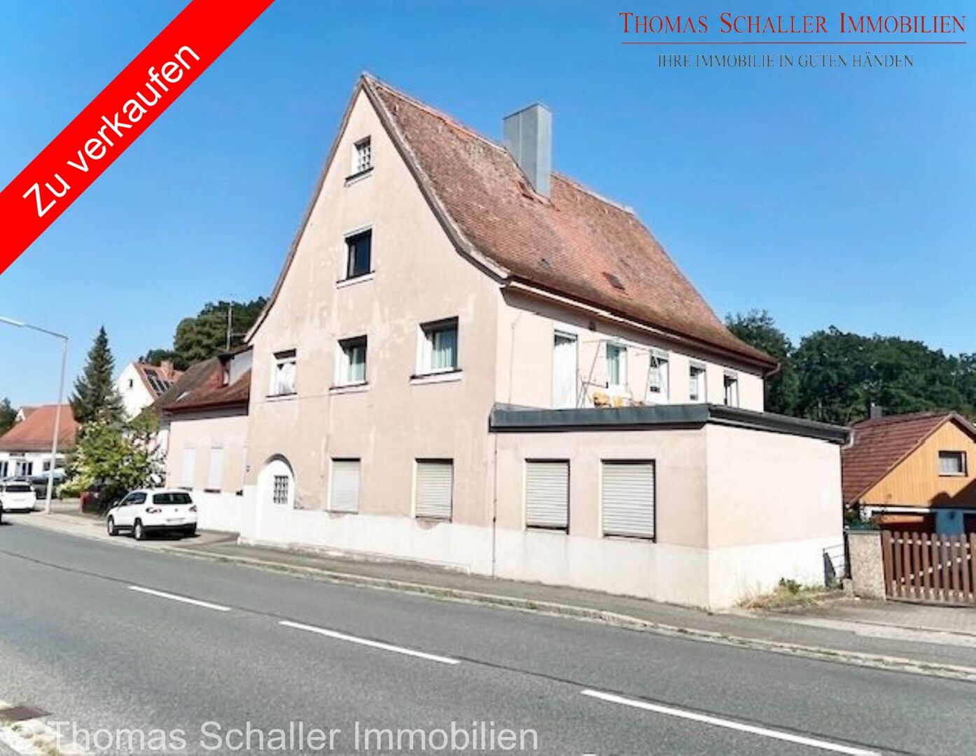 Vielseitiges Mehrfamilienhaus mit großem Potenzial in zentraler Lage