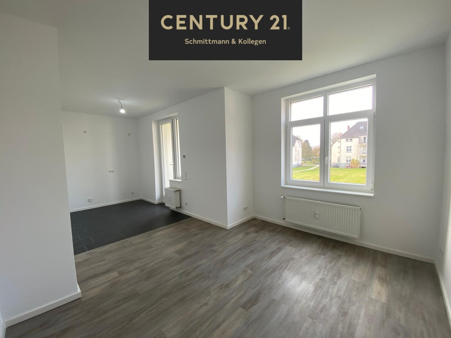 Sanierte Altbauwohnung mit Südwest Balkon im 1. Obergeschoss