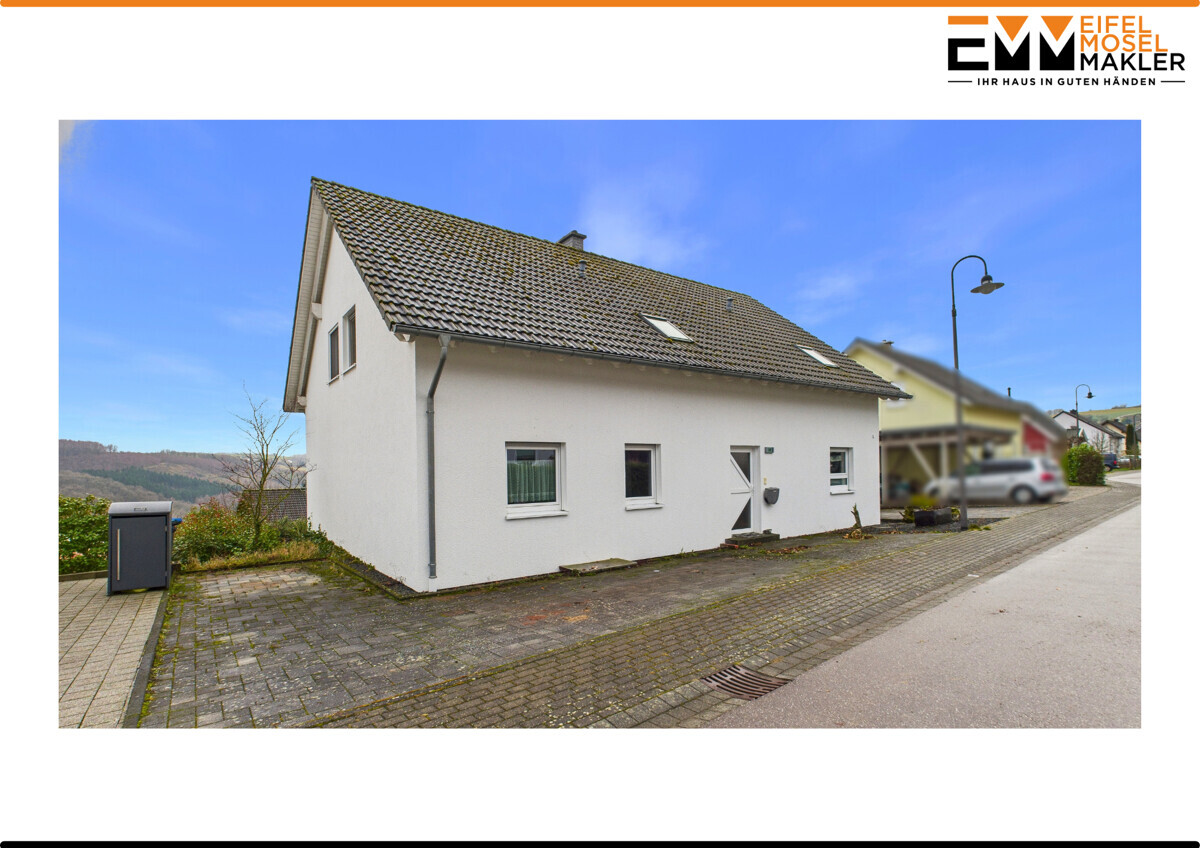 Vielseitiges Zweifamilienhaus mit Weitblick in ruhiger Lage