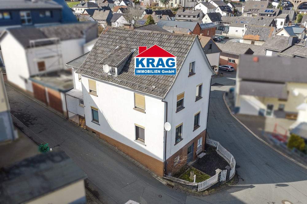 KRAG Immobilien ++ Haus mit zwei Wohnebenen, Garage und viel Potenzial für Eigenleister