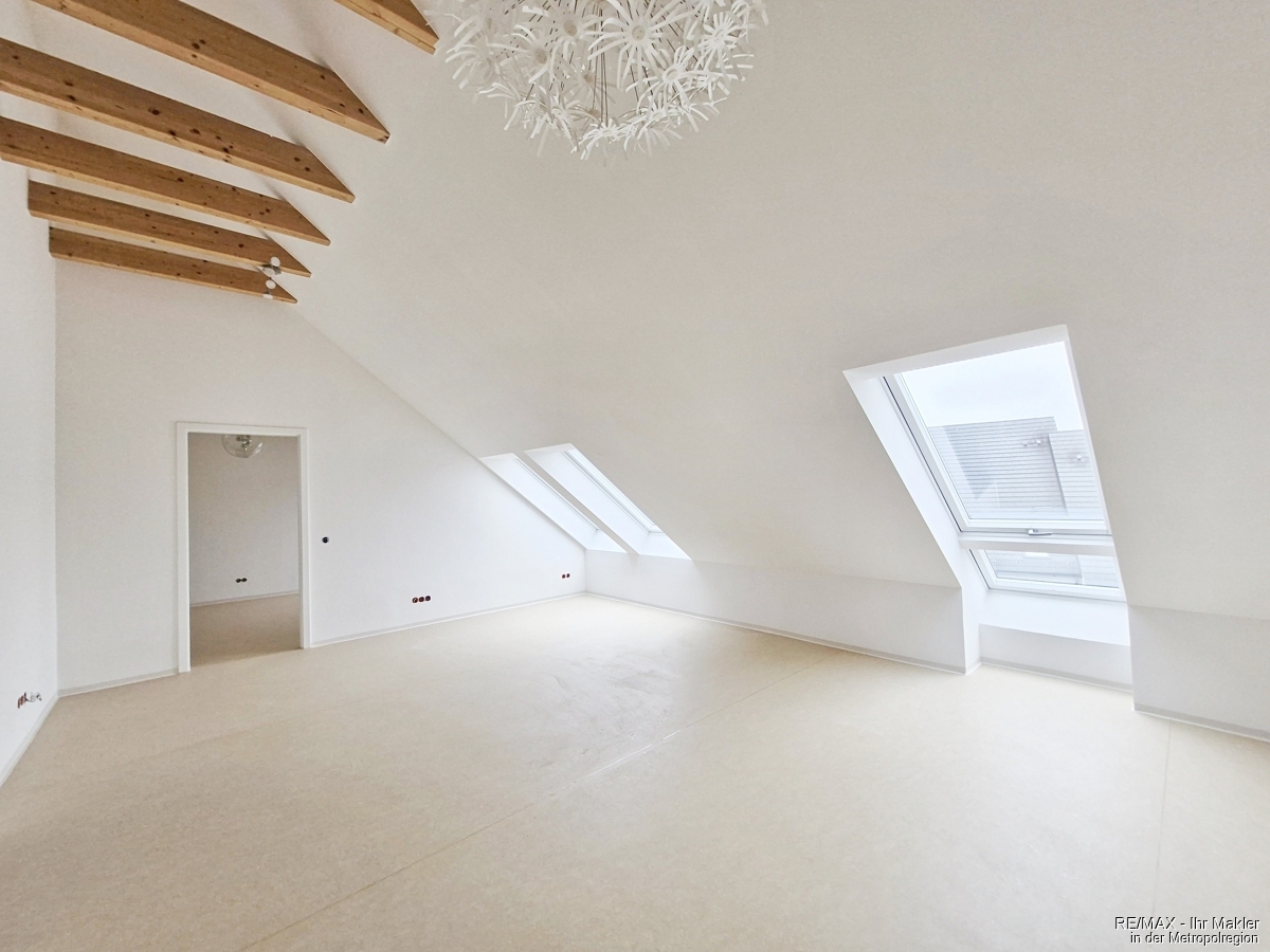 Moderne Dachgeschosswohnung mit Aufzug, Fußbodenheizung & Tiefgarage