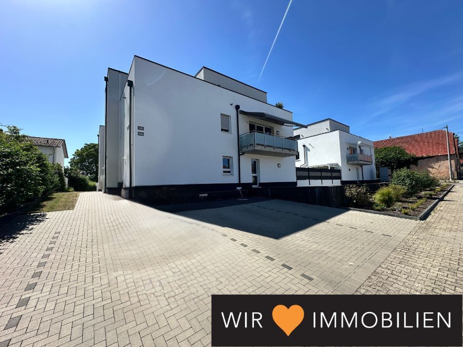 Neuwertige Erdgeschosswohnung inkl. Einbauküche und Tiefgaragenstellplatz