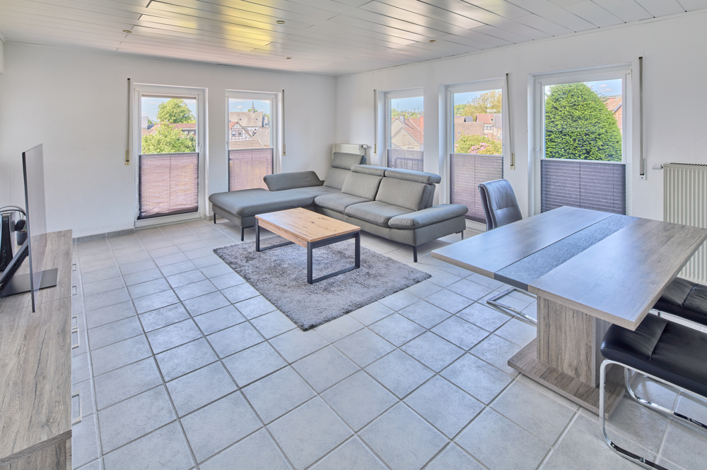 Wohnen im Erdgeschoss
mit Terrasse 
und Balkon