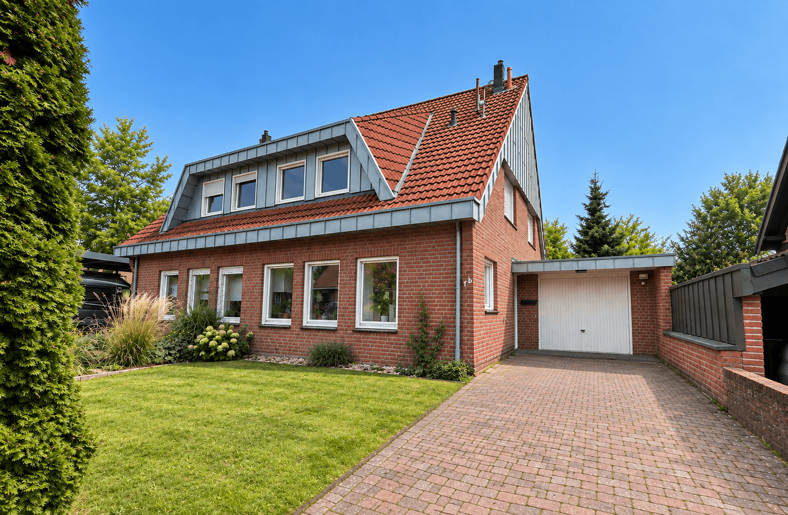 Ein Zuhause zum Ankommen. Charmante Doppelhaushälte mit Garten und Einbauküche in Ochtrup